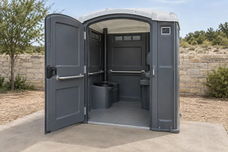 Accessible-style restroom with doorway and grab rails visible