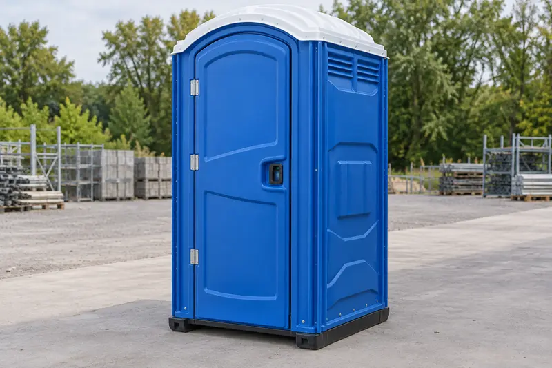 Blue standard portable toilet with its roof and base visible